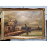 A large Oil on Canvas of a Dutch scene indistinctly signed LL. In a good gilt frame. 78 x 53 cm