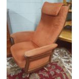 A good Mid Century Armchair and stool. W 74 cm approx.