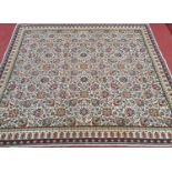 A cream ground carpet with all over floral design and multi borders. 168 x 280 cm approx.
