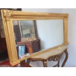 A Superb Regency Timber gilt over mantle Mirror. 150 x 73 cms approx.