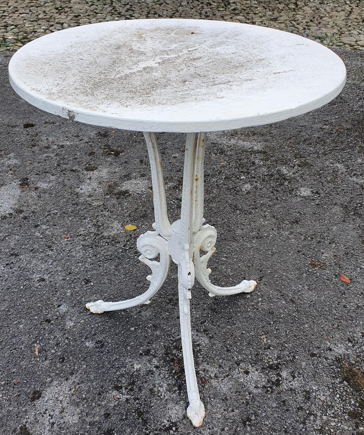 A good heavy Cast iron circular Table with a slate top. H72 x Diam.59cm approx.