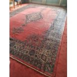 A very large pink ground handwoven Persian Surok Carpet allover Plainfield, with a medallion