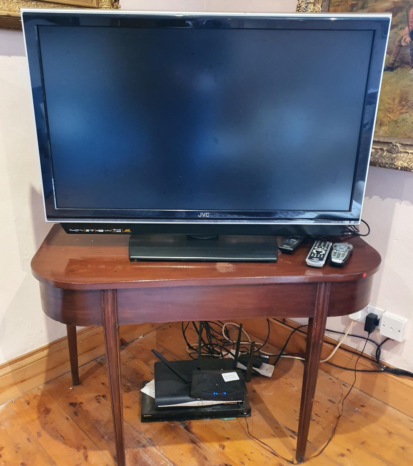 A JVC Flat screen TV and other items.