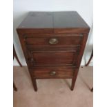 A Georgian Mahogany Gentleman's Washstand with single door front and commode step (lacking bowl).