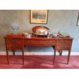 A Superb early 19th Century Mahogany Crossbanded Serpentine fronted Sideboard on tapered inlaid