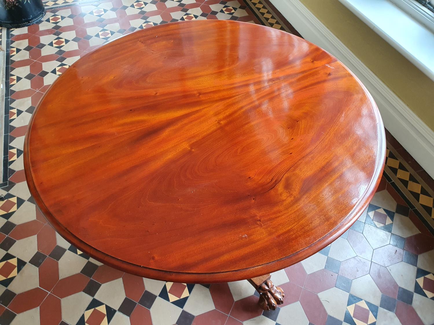 A Victorian Mahogany circular Centre Table with platform base and hairy paw feet. D90 x H72cm - Image 2 of 2