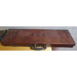 A good early leather Gun case inscribed BDB on the lid along with other items.