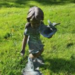 A really good Bronze Figure of a Girl feeding Geese. H54cm approx.