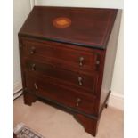 An Edwardian Mahogany Inlaid Bureau along with a single Edwardian caned Chair. H92 x D41 x W74cm