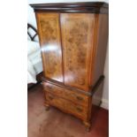 A 20th Century Walnut Cabinet on stand. H143 x D47 x W76cm approx.