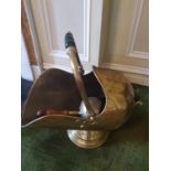 A 19th Century Brass Coal Helmet and Shovel. H45 x D49 x W28cm approx.