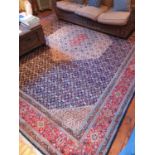 A rich blue ground Persian Beiji Carpet with an allover Sennadash design. 296 x 410cm approx.