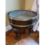 A really good Georgian Irish Wine Cooler with brass crossbanded top on hairy paw supports. 64 x 46 x