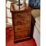 A pair of 19th Century Walnut Bedside Cabinets with four graduated drawers..