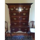 A Superb 19th Century Walnut Chest on Stand with carved ball and claw supports and pediment top.