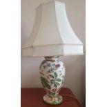 A lovely pair of hand painted Pottery Table Lamps with ivory shades. H62 x Diam,38cm approx.