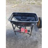 A battery operated Spreader for a Quad. H55 x D50 x W74cm approx.