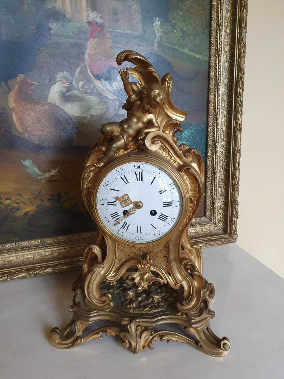 A really good 19th Brass and Ormalu Mantle Clock in the Rococo style.