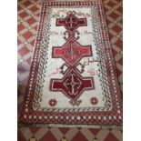 A handwoven naturally dyed Persian Qashqai nomadic Rug, triple medallion design with signatures