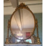 A Most Magnificent 19th Century Timber and Plaster Gilt Overmantel Mirror. The oval centre supported