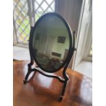 An Edwardian Mahogany Crutch Mirror.