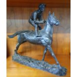 A bronzed figure of a Racehorse with Jockey up. H30 x D6 x W33. Largest 42 x W60cm approx.
