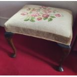 An early 20th Century Mahogany Stool with tapestry upholstery top on cabriole supports. H50 x D45