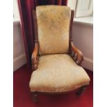 A 19th century Mahogany Showframe Salon Chair with gold coloured damask upholstery on turned