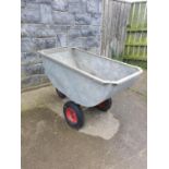 A Galvanised Wheelbarrow. H74 x D76 x W214cm approx.