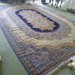 A large blue and green ground Belgian Carpet with allover decoration and multi borders. 470 x