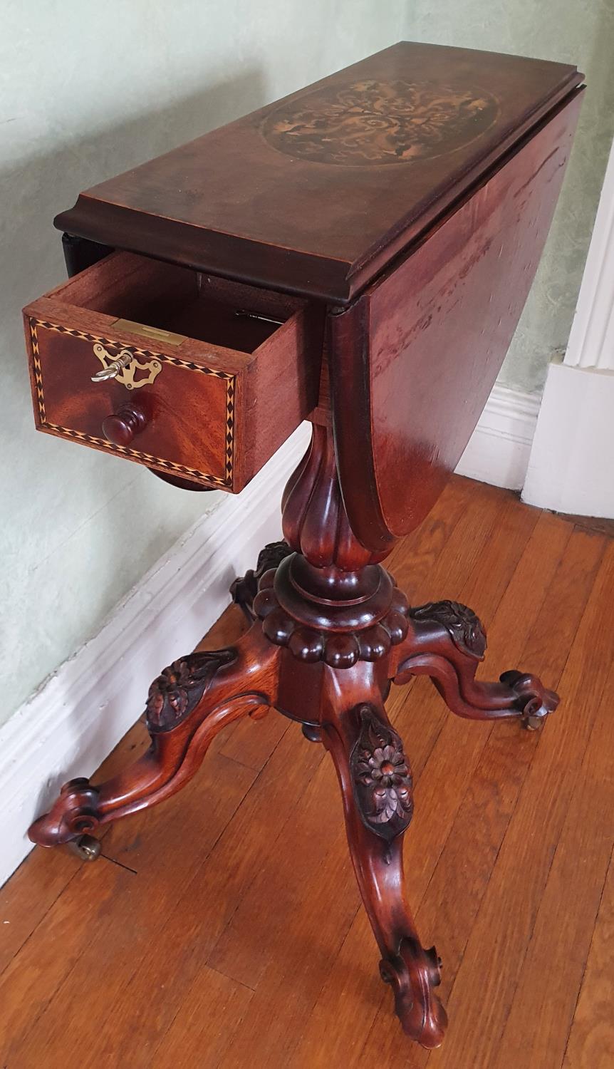 A late 19th early 20th Century oval Walnut Side Table with drop leaves on a turned carved base, - Image 4 of 4