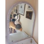 A Painted and Gilt Arch top Mirror with carved detail. W84 x H108cm approx.