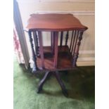 An Edwardian Mahogany Miniature Revolving Bookcase with serpentine outline. 35 x 35 x 71cm approx.