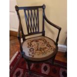 A good set of eight Mahogany Elbow Chairs with lattice backs tapered supports and arms and