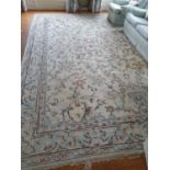 A very large cream ground Carpet with unique allover decoration and multi borders. 460 x 370cm