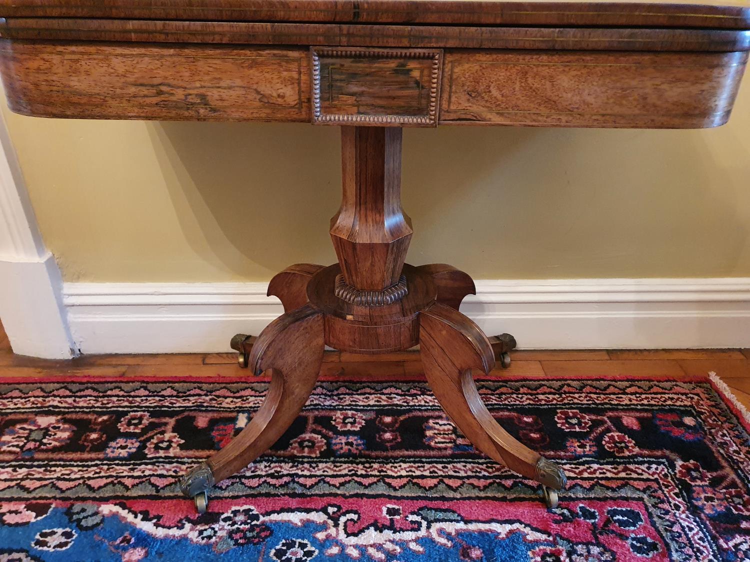 A Magnificent Regency Rosewood and Brass inlaid Foldover Card table on a moulded platform base and - Image 3 of 5