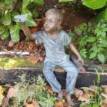 A really good Bronze Figure of a Boy holding a Butterfly. L51cm approx.