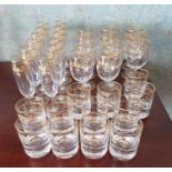 A really good quantity of Art Deco Baccarat Glasses, consisting of twelve Champagne Flutes, eleven