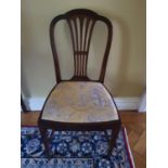 A lovely set of four late 19th Century Mahogany Chairs with pierced backs and tapered front supports