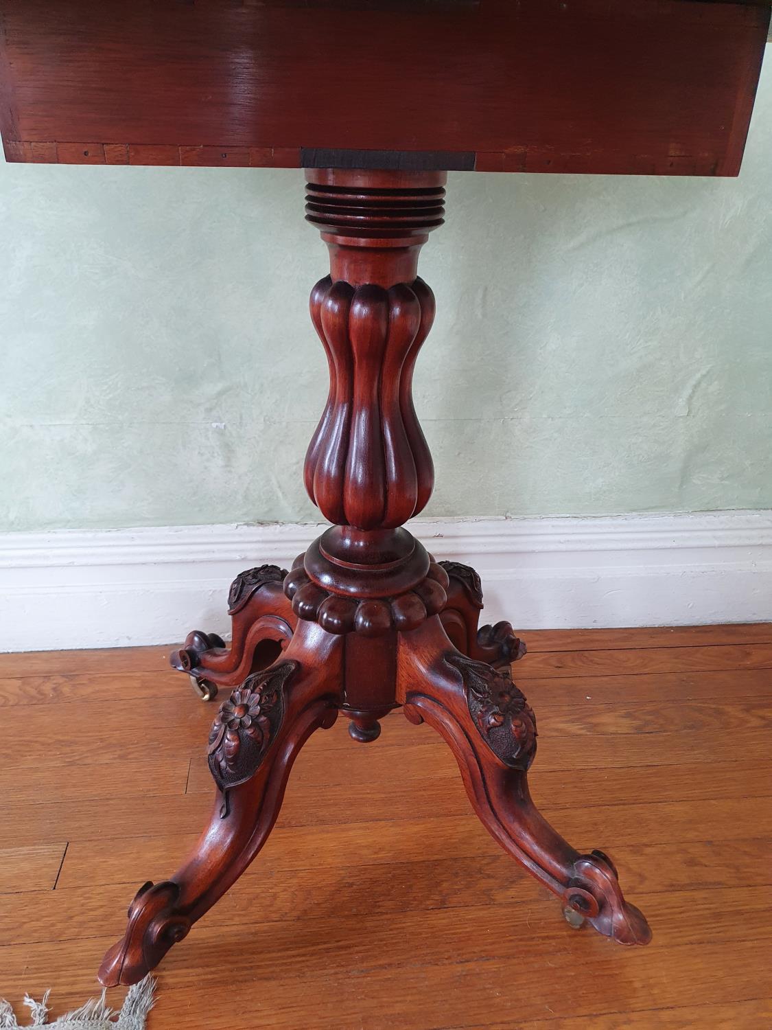 A late 19th early 20th Century oval Walnut Side Table with drop leaves on a turned carved base, - Image 3 of 4