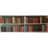 A really good quantity of Books on four shelves.