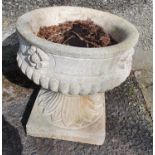 A lovely pair of Stone Pots with variegated detail.