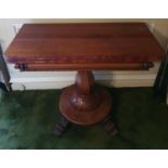 A really good 19th Century Mahogany fold over Tea Table with carved hairy paw feet on acanthus