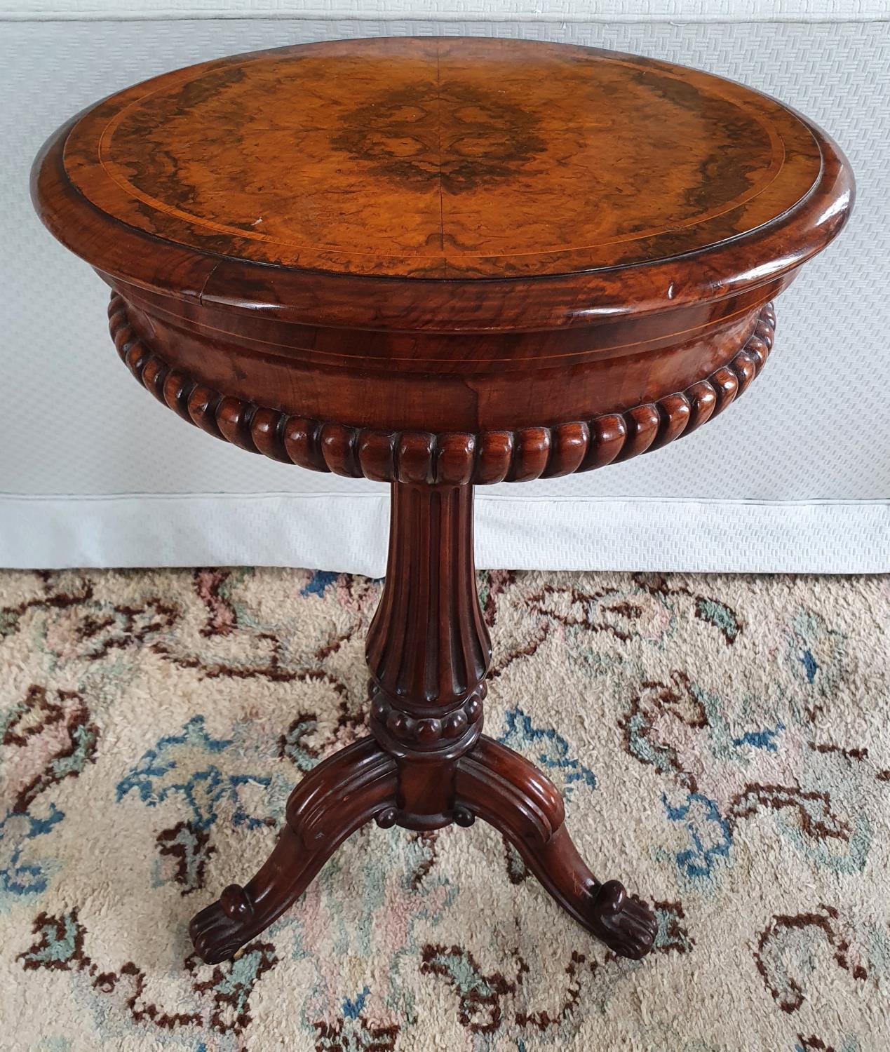 A Fabulous Walnut Inlaid oval Work Box on stand with highly reeded outline on turned carved