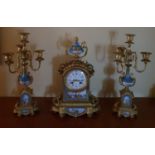 A Fantastic 19th Century Ormolu French Mantel Clock Garniture, with Serve style panels.
