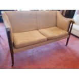 A good 19th Century high back upholstered Couch in the Regency style with turned and reeded front
