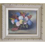 An Oil on Canvas by B B Kent 'Basket of Roses and other flowers'. Signed LR. 38 x W45cm approx.