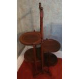 An Edwardian Mahogany fold up Cake Stand.