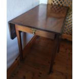 A Regency Mahogany Pembroke Table on square tapered supports. H75 x D89 x W94cm approx.