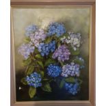 Elizabeth Cameron (20th Century) Blue Hydrangeas. A large signed Oil on Canvas. 75 x 60cm approx.